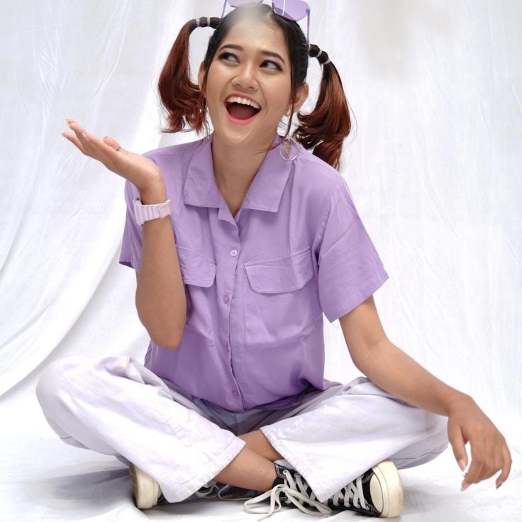 Ava Sharma, Lead Design Curator at Verdant & Vine, reviewing corporate floral arrangements